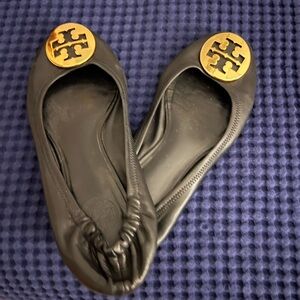Tory Burch Black Flats with Gold Logo Emblem